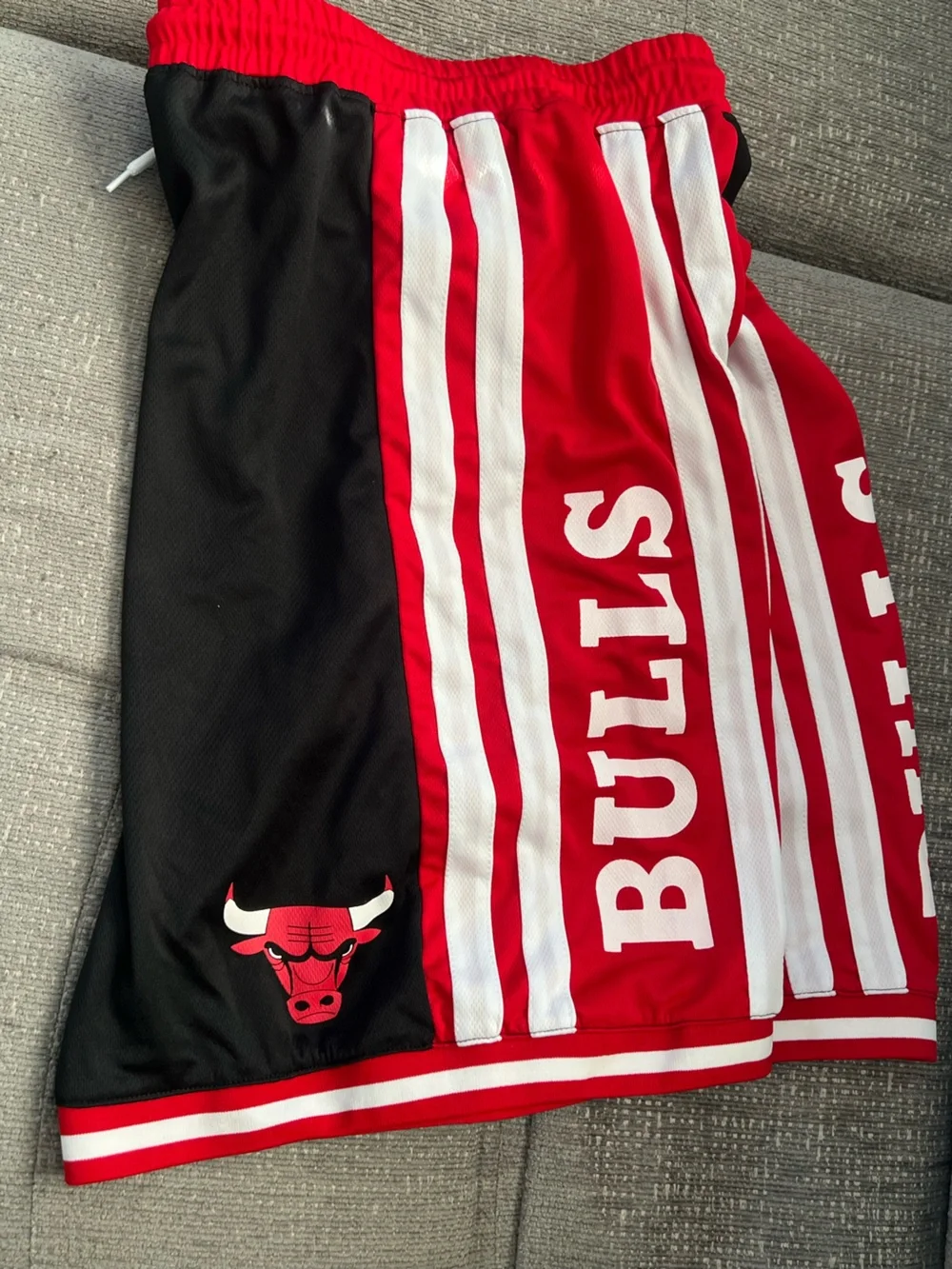 NBA Chicago bulls Black Athletic Shorts with Red and White Trim. K33